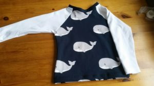 Raglan-tröja med valmotiv